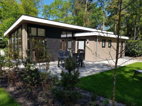 Beautiful Chalet With A Fireplace In A Wooded Area
