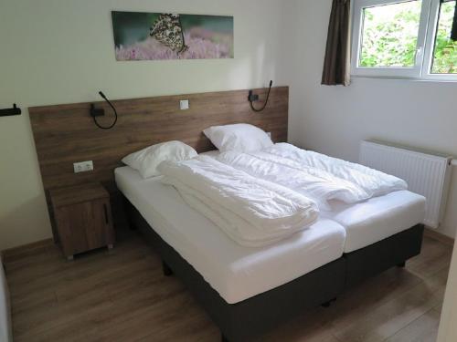 Spacious Chalet With Decorative Fireplace, Located On The Veluwe