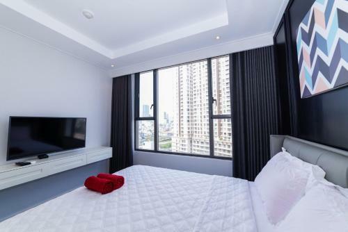 Apartamento Ao Homestay - Rivergate Residence