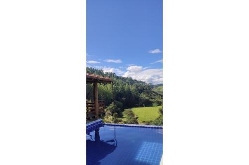 Chal� Master Com Piscina De Borda Infinita