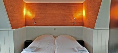 Hotelhuisje Warmenhuizen #d