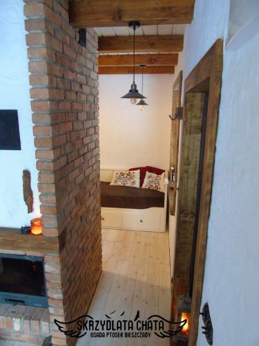Skrzydlata Chata / Osada Ptosek Bieszczady