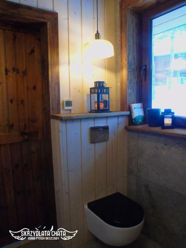 Skrzydlata Chata / Osada Ptosek Bieszczady