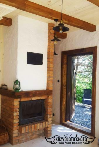 Skrzydlata Chata / Osada Ptosek Bieszczady