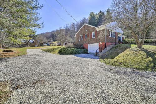 Quaint Creekside Home With Spacious Deck And Yard