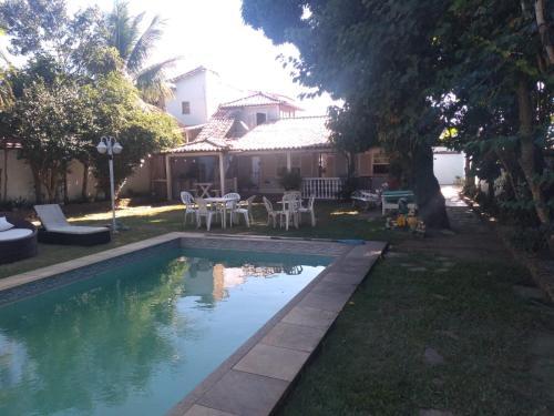 Casa Com Piscina Em Gerib� Para Temporada.