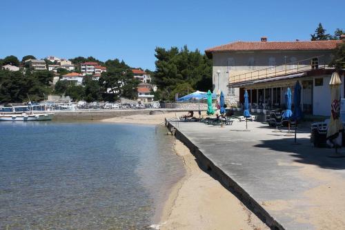 Apartments With A Parking Space Palit, Rab - 14996