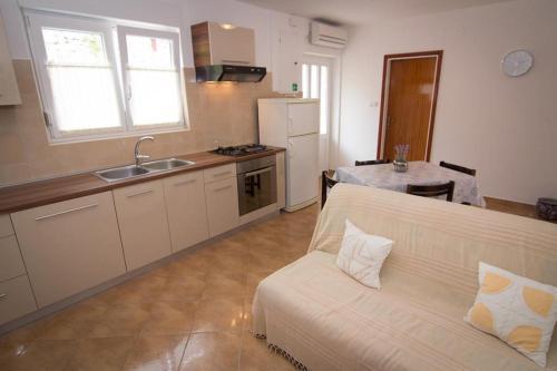 Apartments With A Parking Space Palit, Rab - 4970