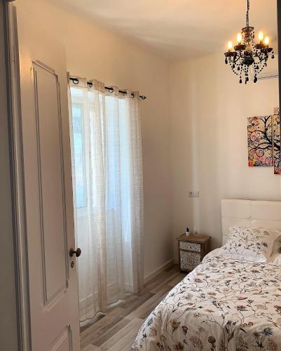 Casa Amendoeira Olh�o