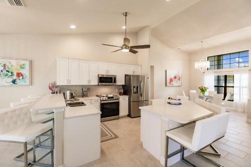 Waterfront Home With Golf Access & Heated Pool