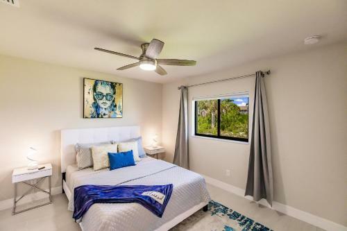 Waterfront Home With Golf Access & Heated Pool