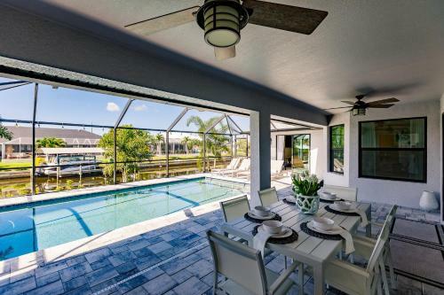 Waterfront Home With Golf Access & Heated Pool