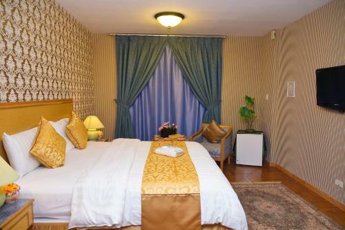 Mansour Plaza Hotel Apartments