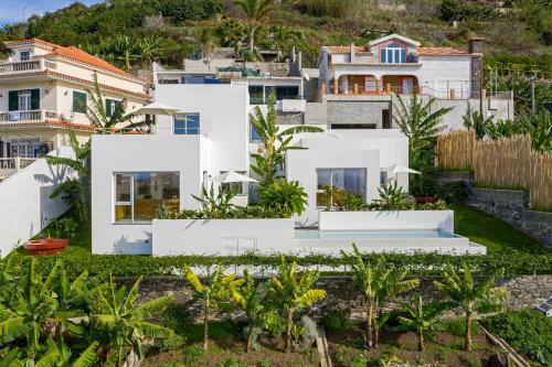 Casas Da Vargem Shared Swimming Pool By An Island Apart