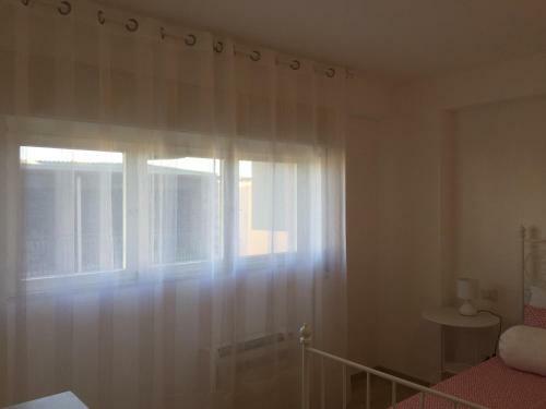 Baia Giardini Apartments