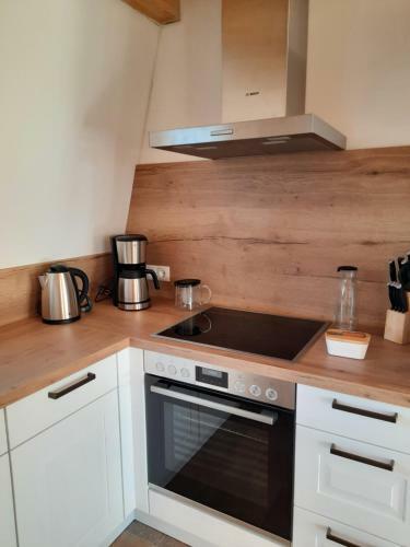 Apartamento Hof Ruemland Ferienwohnungen