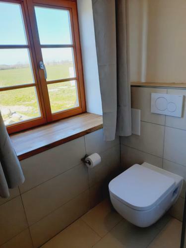 Apartamento Hof Ruemland Ferienwohnungen