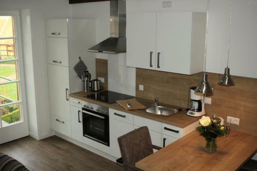 Apartamento Ferienwohnung Lodberger Scheunencafe