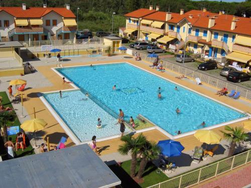 Delightful Holiday Home In Rosolina With A Shared Pool