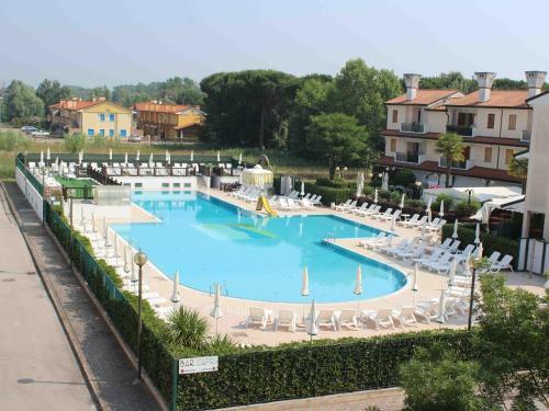 Charming Holiday Home In Rosolina With Communal Pool