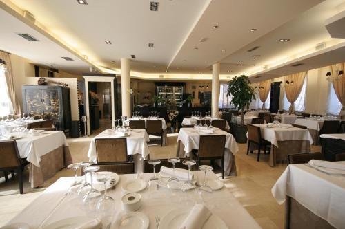 Hotel Asador H.m. Versus