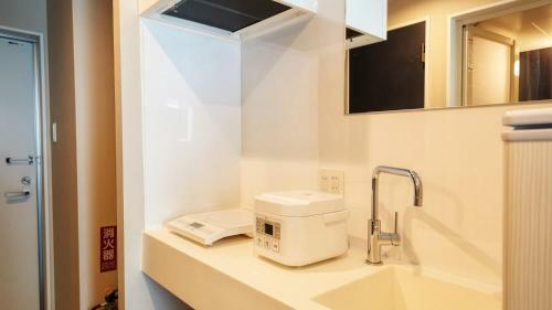 Hotel New Normal Condo In Naha Airport