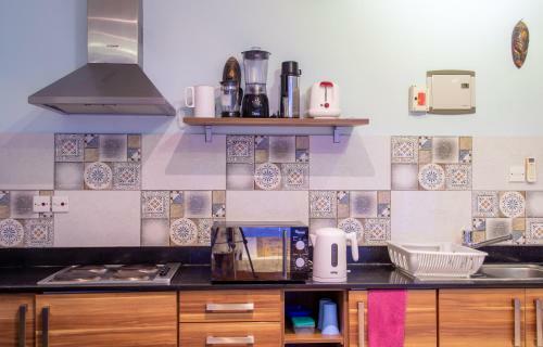 Apartamento Cowrie Beach Haven Studio