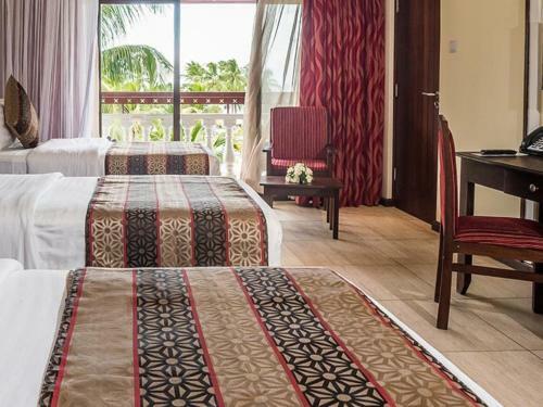 Hostal Room In Bb - Prideinn Flamingo Beach Resort Spa