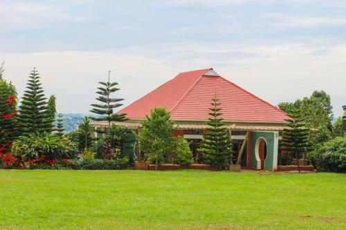 Kinzi Apartments,restaurant And Gardens