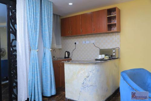 Apartamento Percentage Homes Kyanja