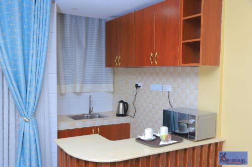 Apartamento Percentage Homes Kyanja
