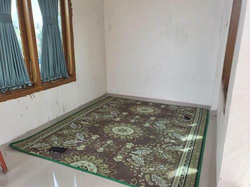 Hotel Oyo 90945 Arizon Kost