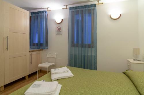 Hostal Veneziacentopercento Rooms