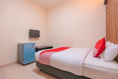 Hotel Oyo 122 Oekude Kost