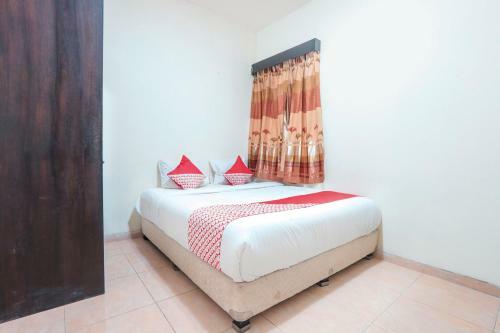 Hotel Oyo 122 Oekude Kost