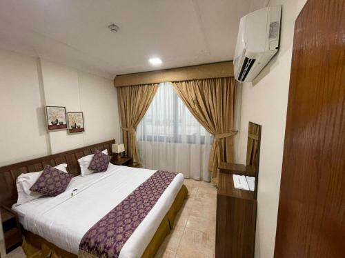 Apartamento Enwan Suites Hotel