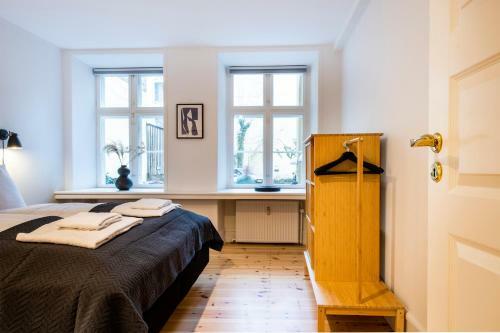 By Town Hall Apartments - Into This Place
