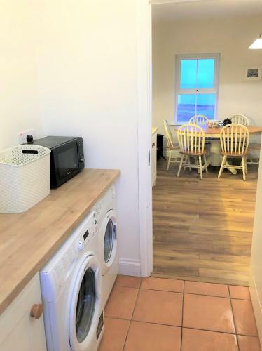 Apartamento Doughbeg Beach Cottage