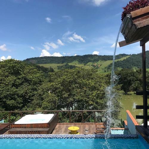Hostal Aconchego Su�tes