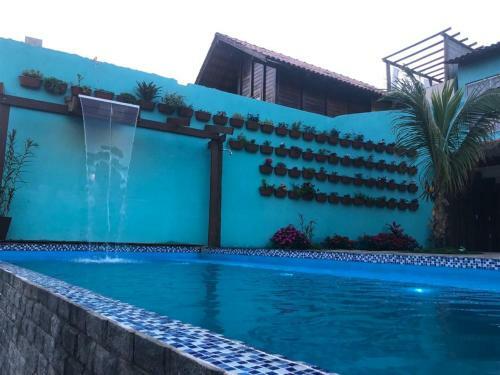 Hostal Aconchego Su�tes
