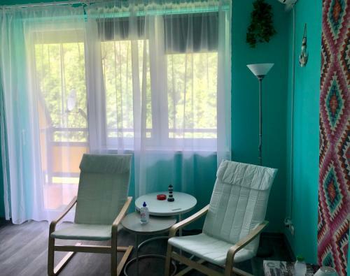 �va Apartman, Helikon-liget