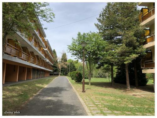 �va Apartman, Helikon-liget