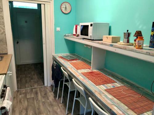�va Apartman, Helikon-liget
