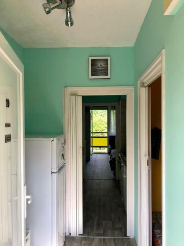 �va Apartman, Helikon-liget
