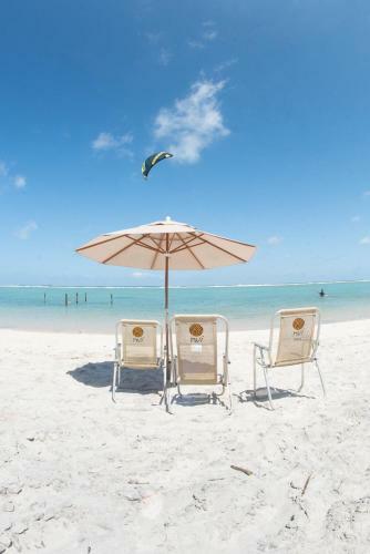 Apartamento Nui Supreme Resort - Ref�gio � Beira Mar