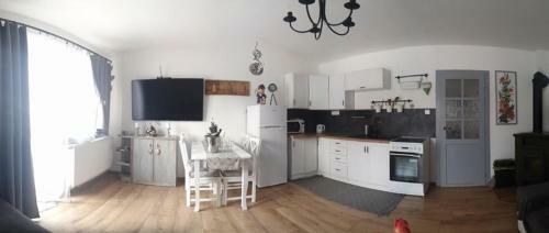 Apartm�nov� Dom Adas