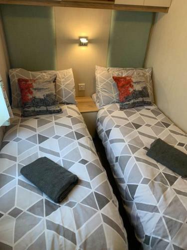 Woodpecker Lodge, Camelot Holiday Park, Ca6 5sz