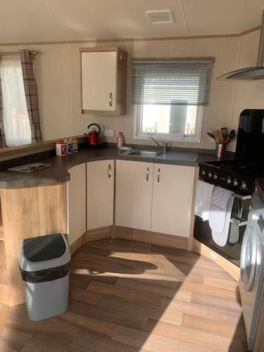 Woodpecker Lodge, Camelot Holiday Park, Ca6 5sz