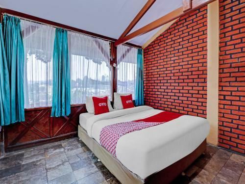 Oyo 90582 Nur Alam Hotel