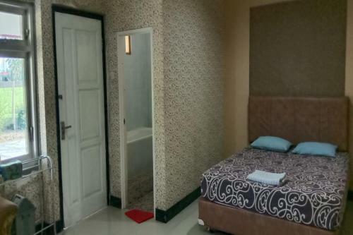 Oyo 90627 Hotel Mutiara